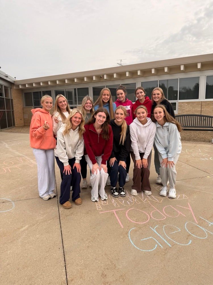 students chalking the walk before school 