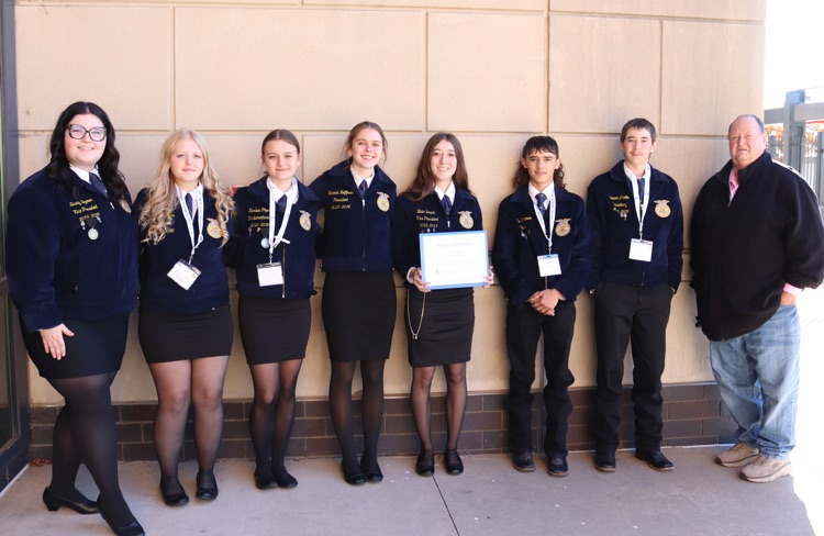 Blair Dowell receiving her American Degree