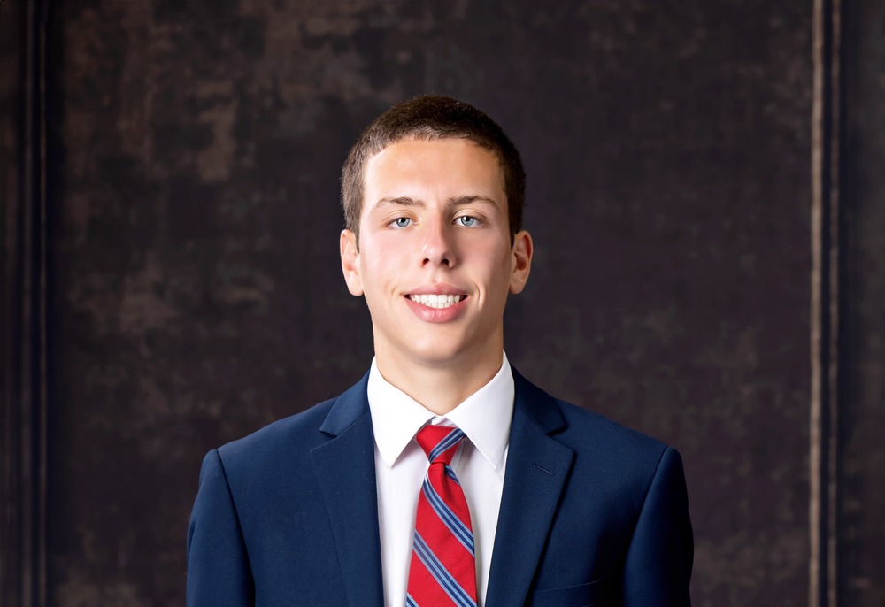 Bruce Miller poses for a picture