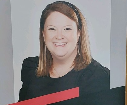 A picture of Mrs. Russell on a poster