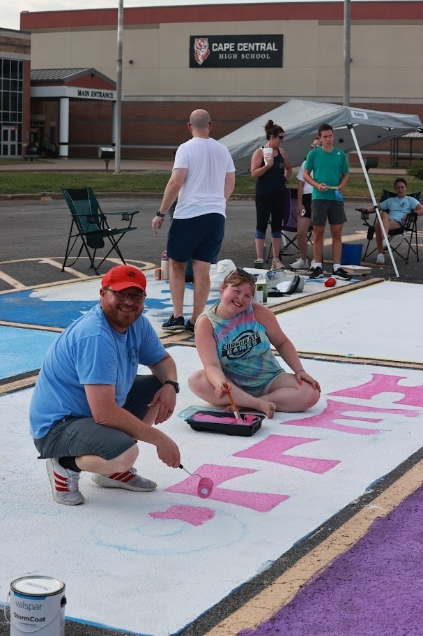 Student getting help from dad.