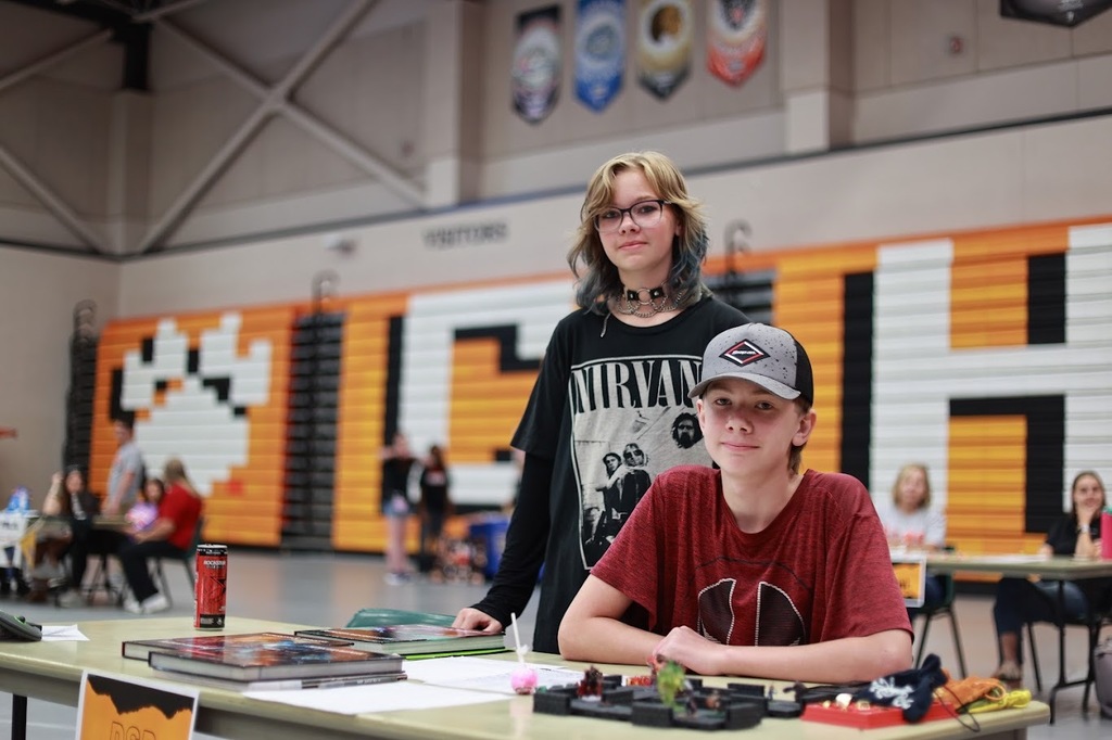 Upper grade students manned many tables to help answer questions.