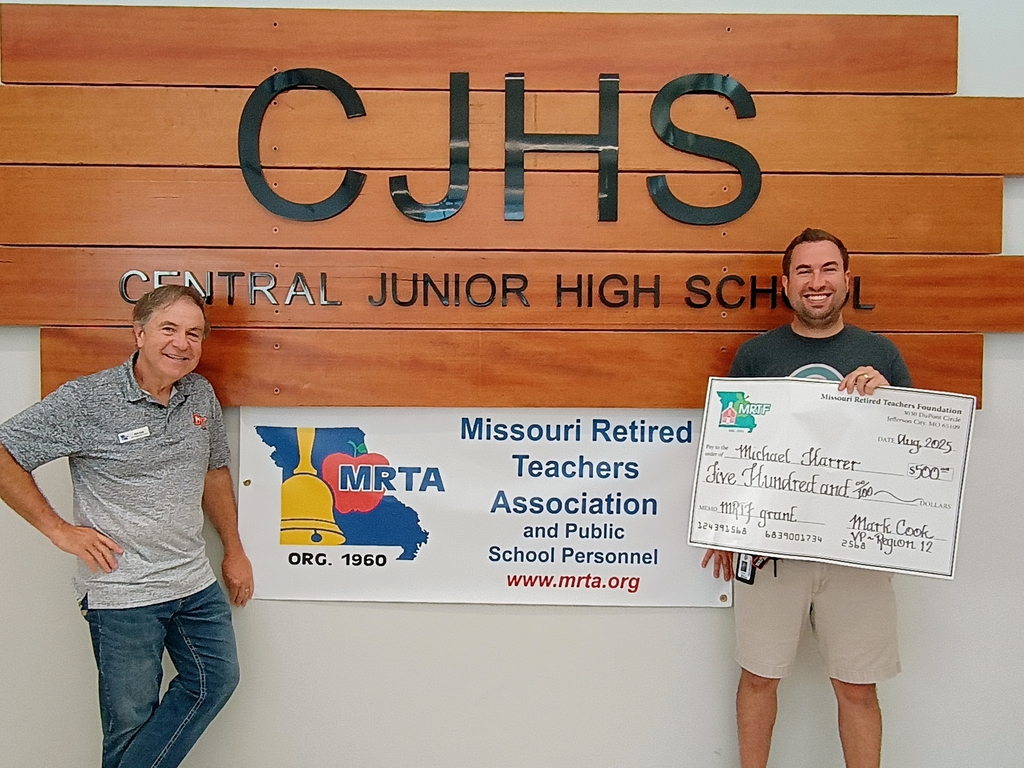 Mr. Harrer pictured with Mr. Cook