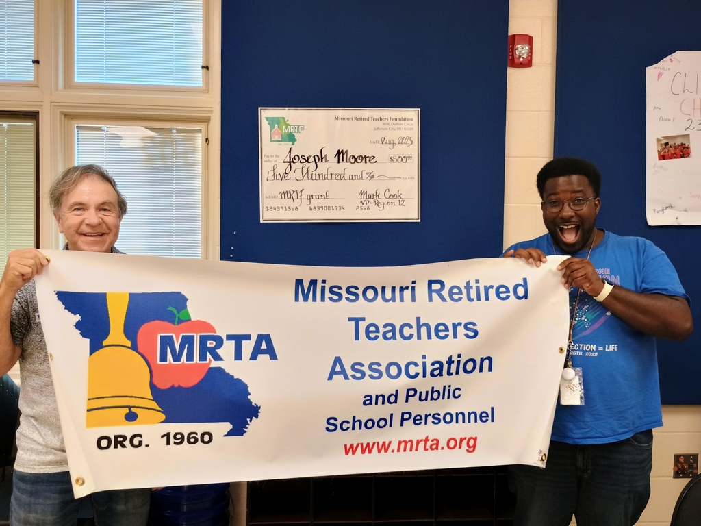 Mr. Cook pictured with Mr. Moore
