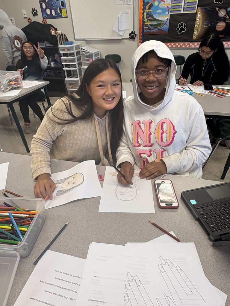 Students work on hair styles