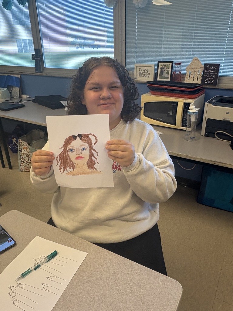 Student shows off her hair design