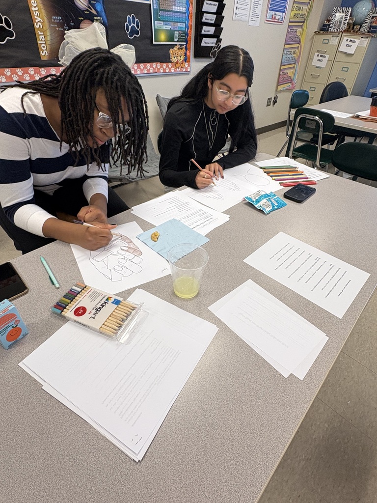 Students work on finger nail designs