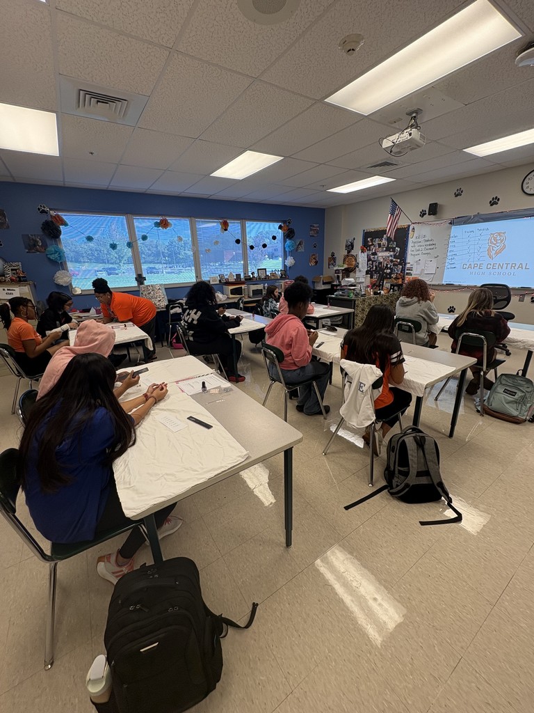 Students work on nail care.