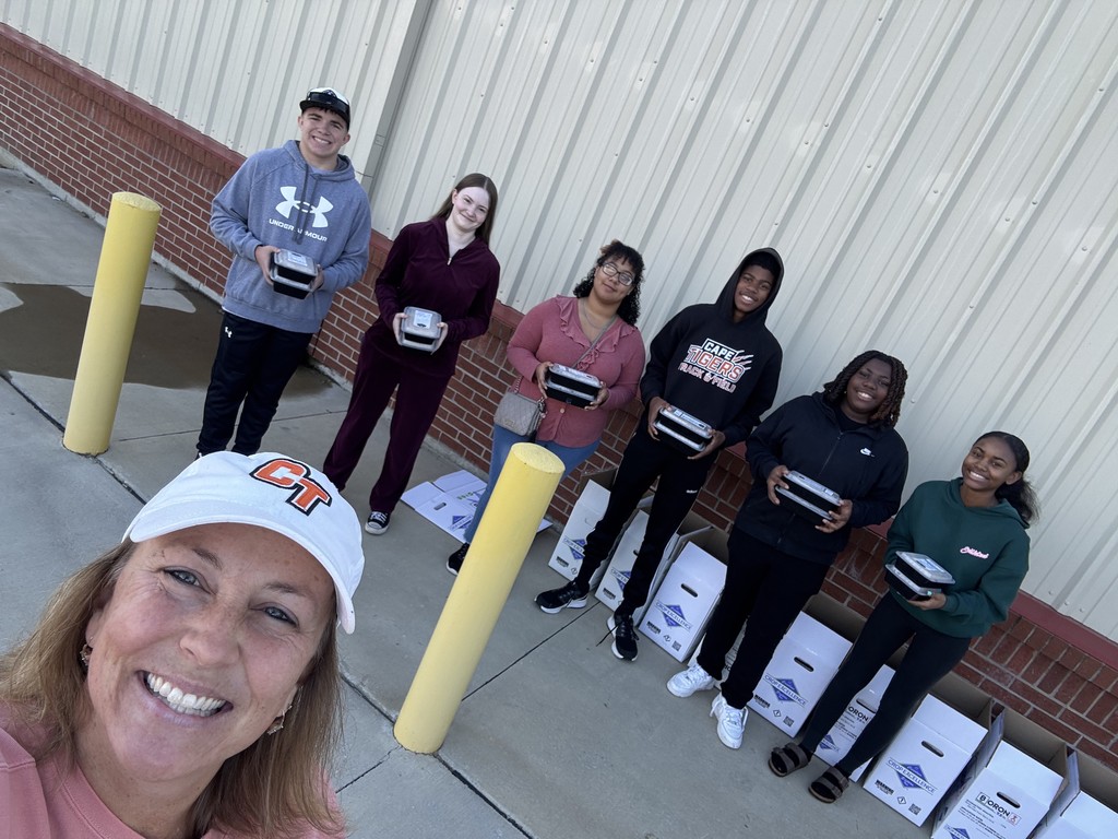 Mrs. Newman and some members of the foods class.