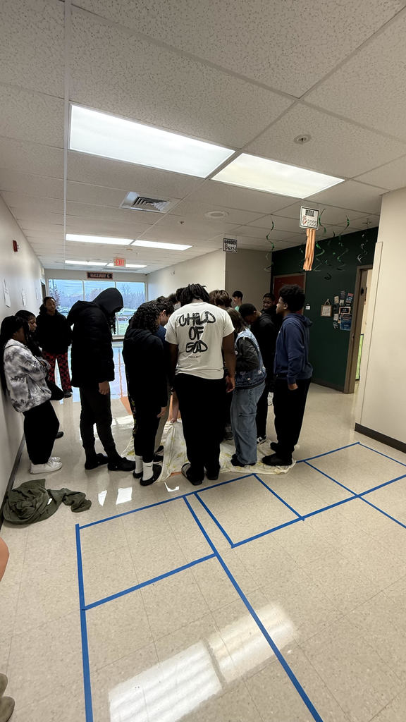 Students participate in team building activity