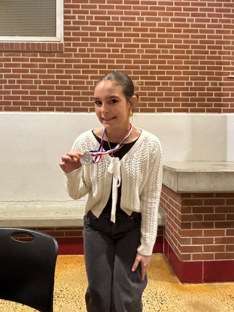 Vivian with her medal