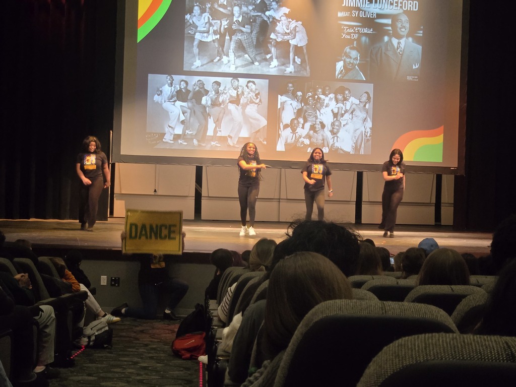 Girls dance to songs of the time period