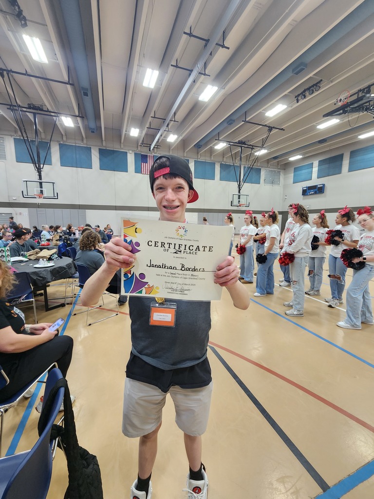 Jonathan shows off his certificate 