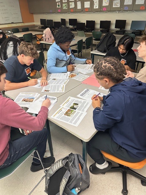 Students reading the facts of the case.