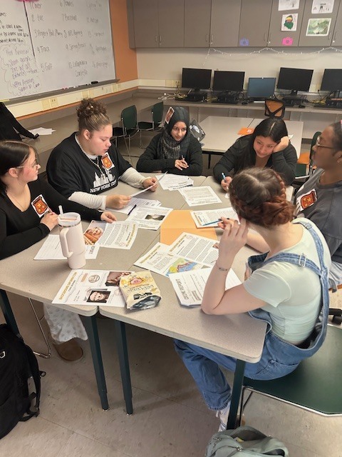 Students discussing the facts.