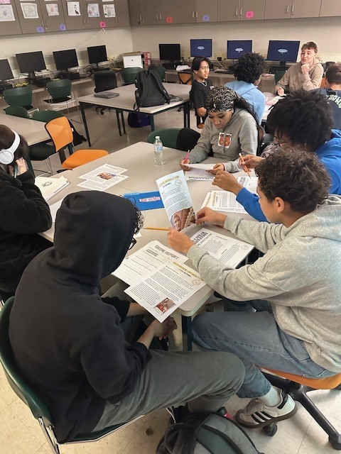 Students reading the facts of the case.