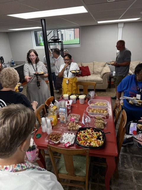 CA Staff is getting breakfast served from our partners at Cape La Croix. 