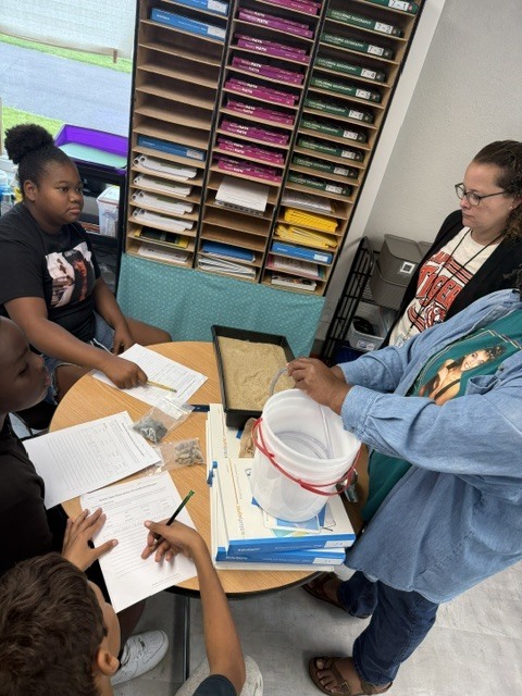 CA - Teachers demostrate the science project