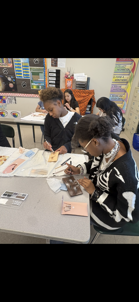Students practice lashes