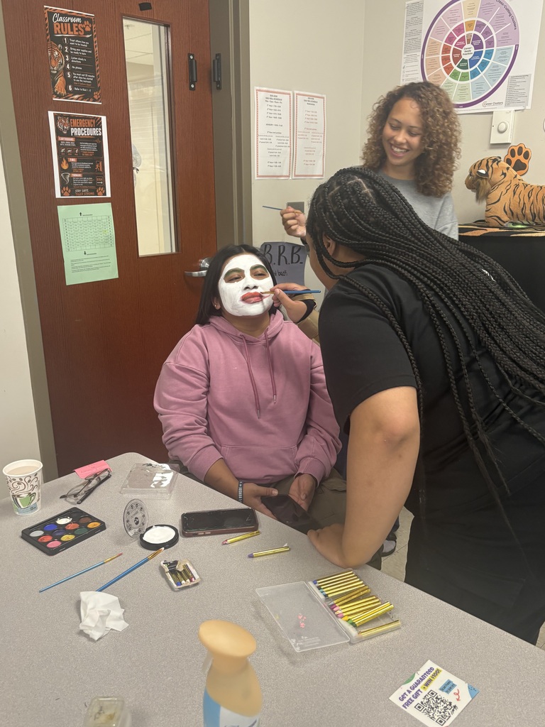 Painting a student's face