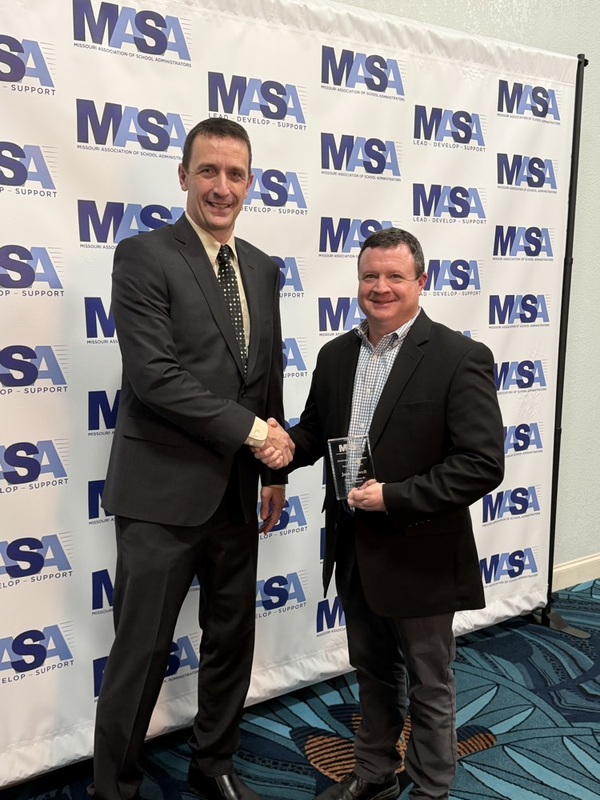 Mr Crowell with his award