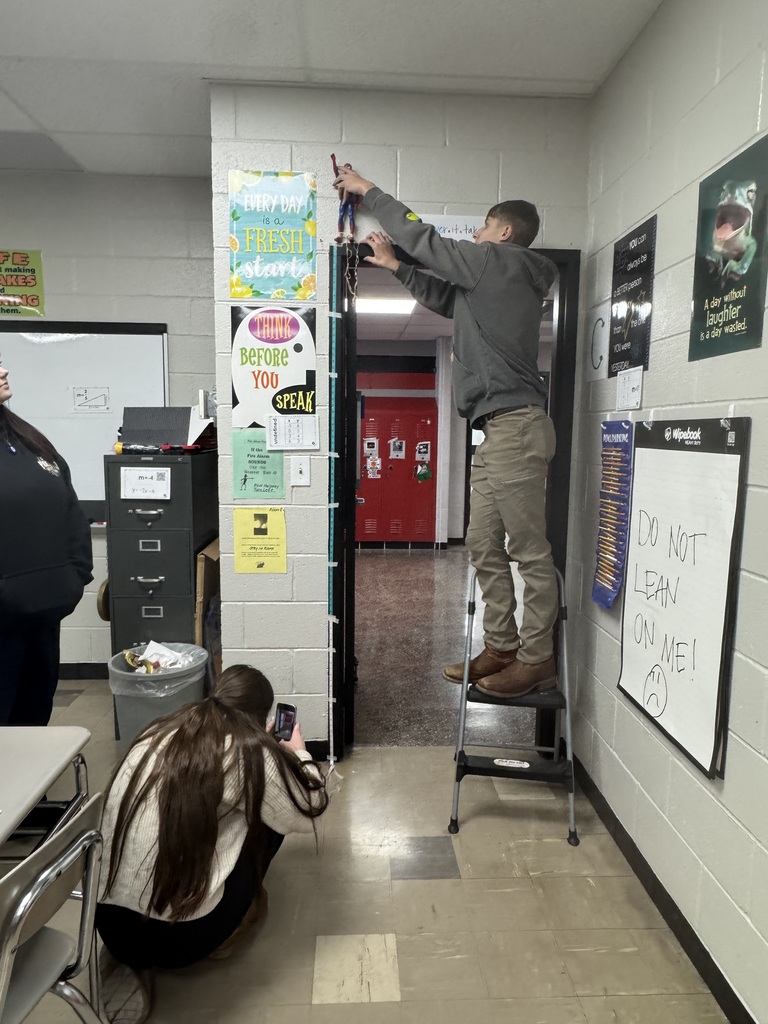 AQR Class with Barbie Bungies - Mrs. Mazzolini's class experimented with dolls and rubber bands to collect data to make linear regressions for their final drops in the gym.