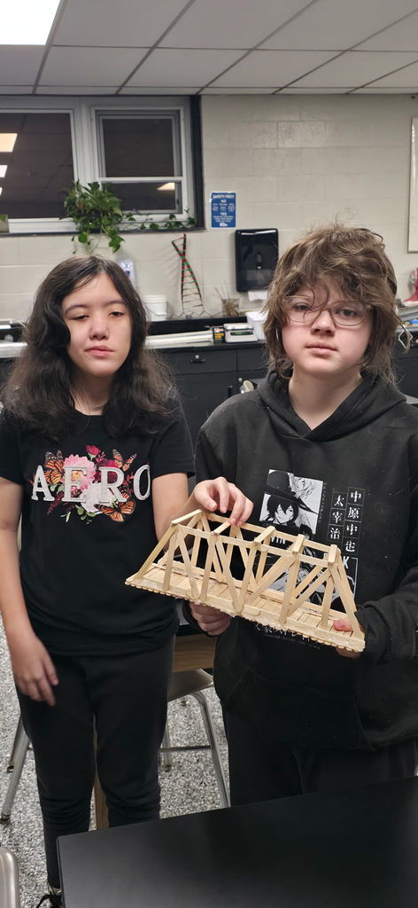 8th Grade Students Built Bridges to test their strength.