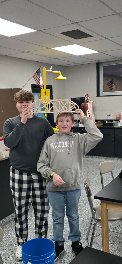 8th Grade Students Built Bridges to test their strength.