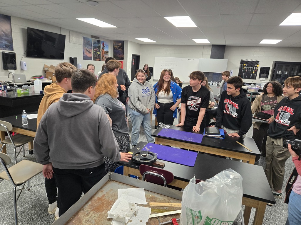 8th Grade Students Built Bridges to test their strength.