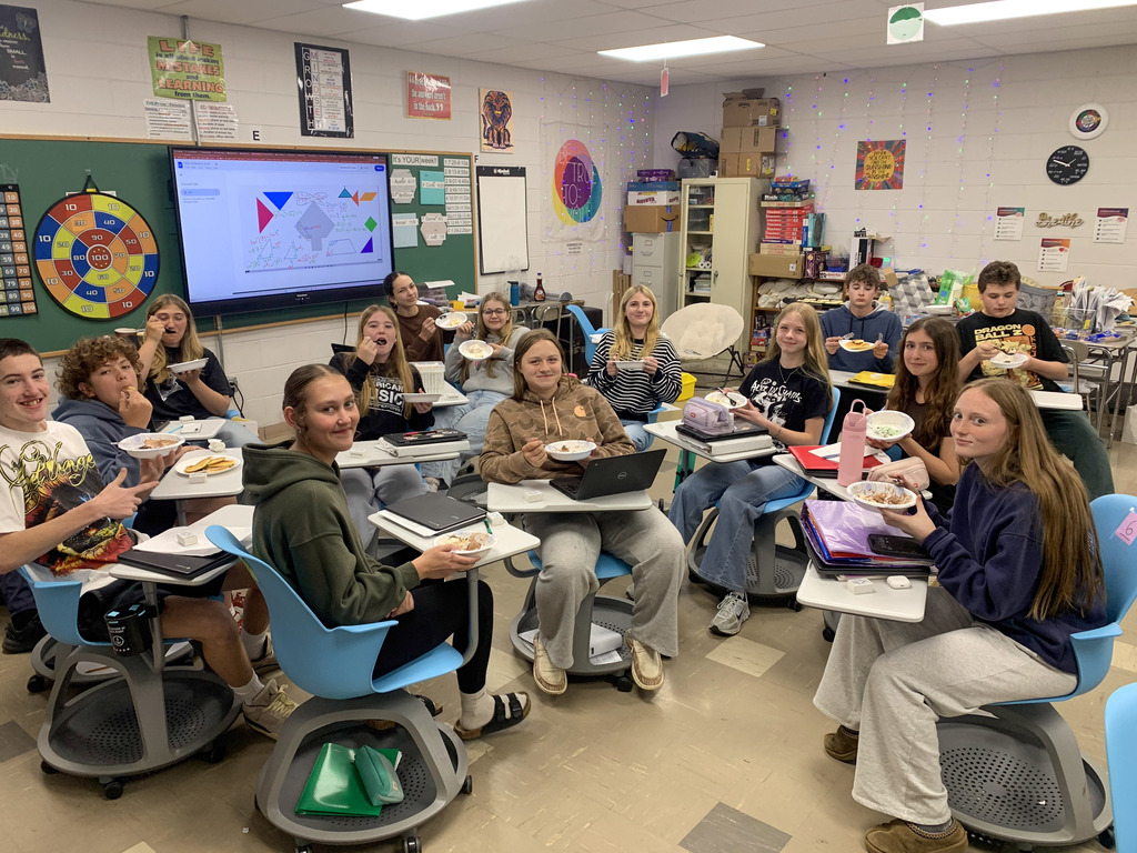 Students in Mrs. Blair's Honors Geometry Class earned a pancake and ice cream party for passing all of their exams.