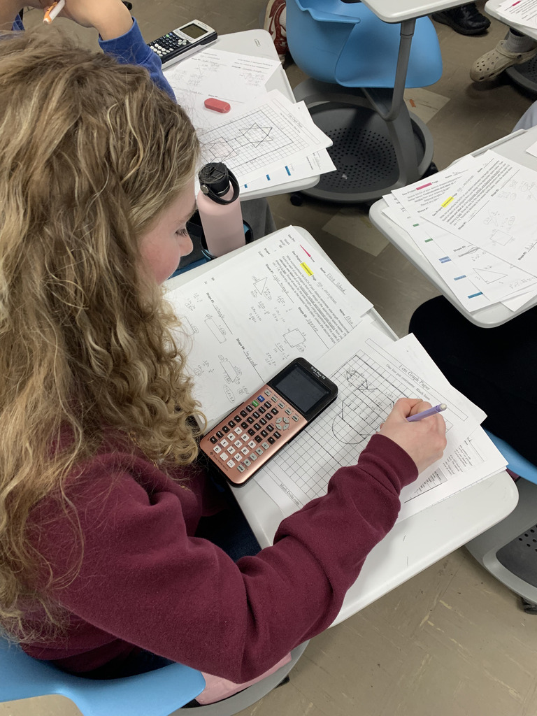 Students in Mrs. Blair's geometry class working on their stained glass assignments.