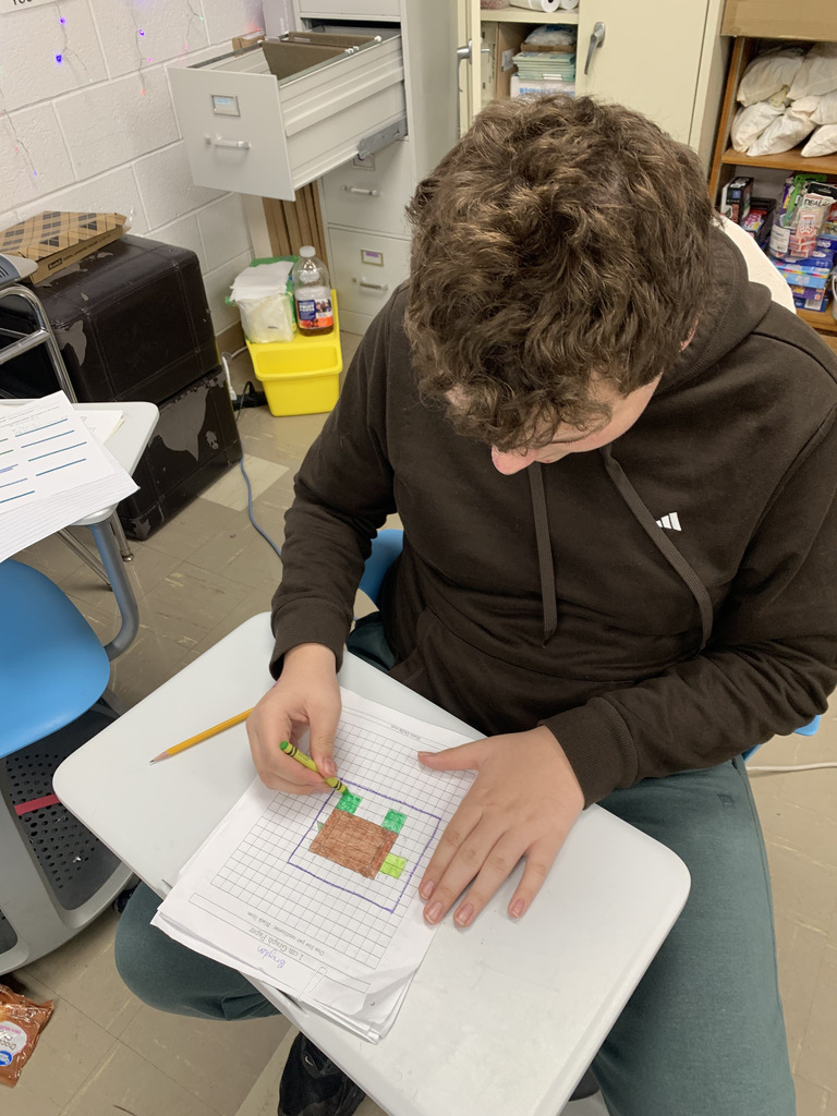 Students in Mrs. Blair's geometry class working on their stained glass assignments.