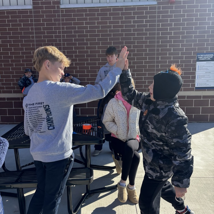 Karson shares a high five with his buddy!