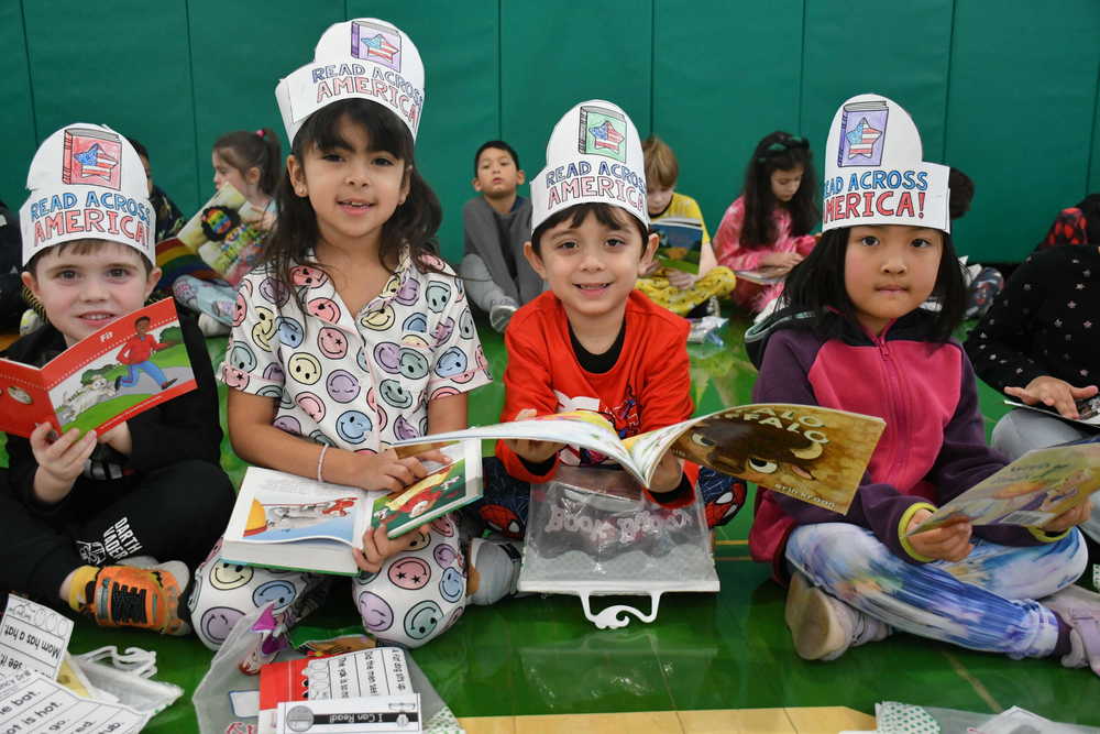 Cherry Lane students wearing paper hats.