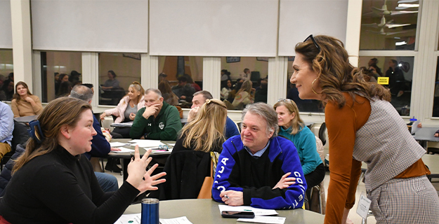 Parents talking to students.