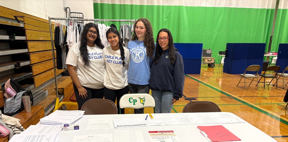 students at table of the key club