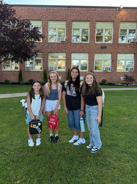 group photo in front of school