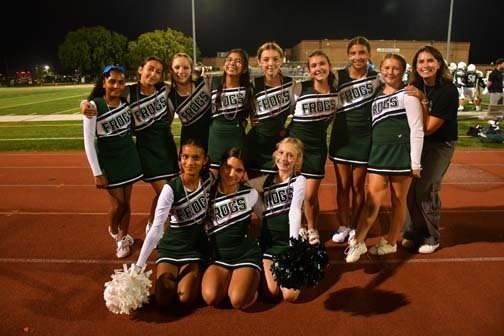 Cheerleading team group photo.