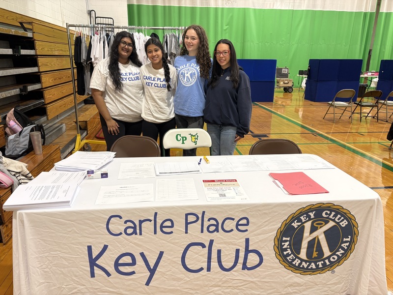 students at table of the key club