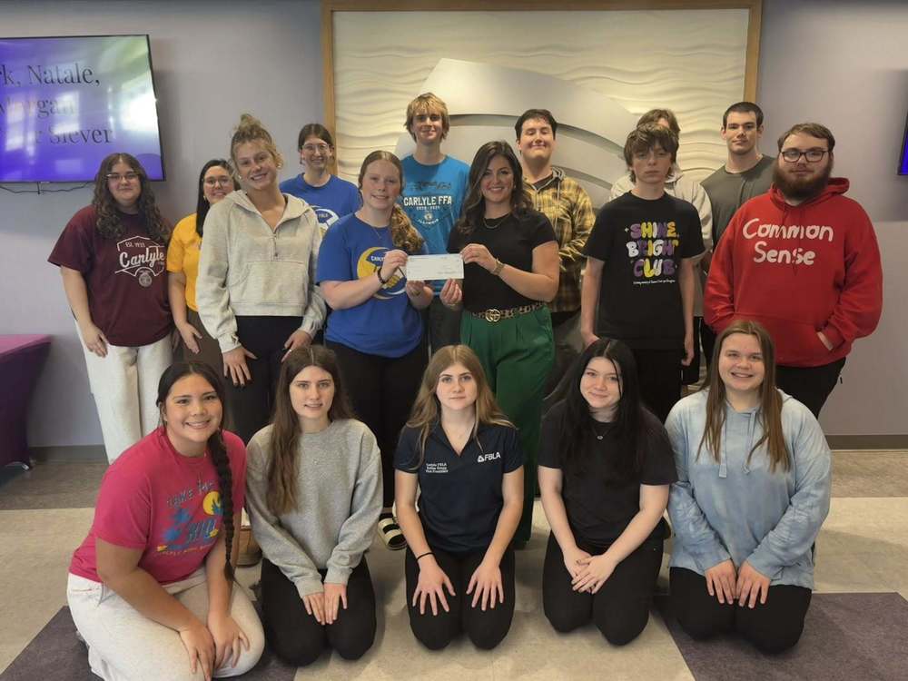 group photo of check presentation