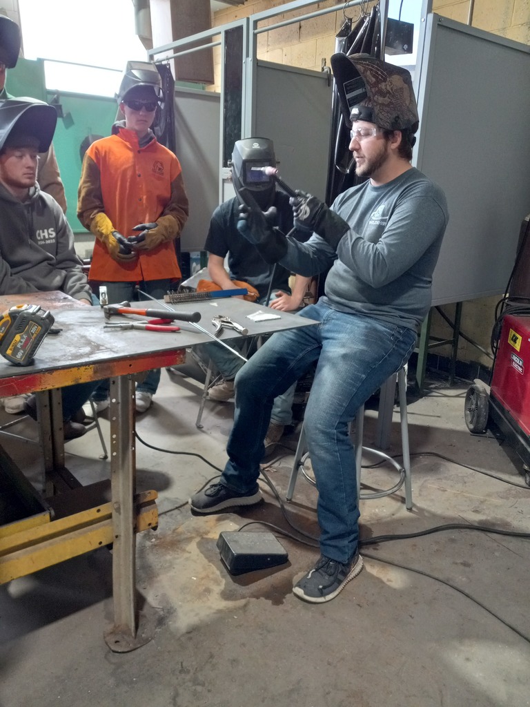 Students learn about welding in the shop