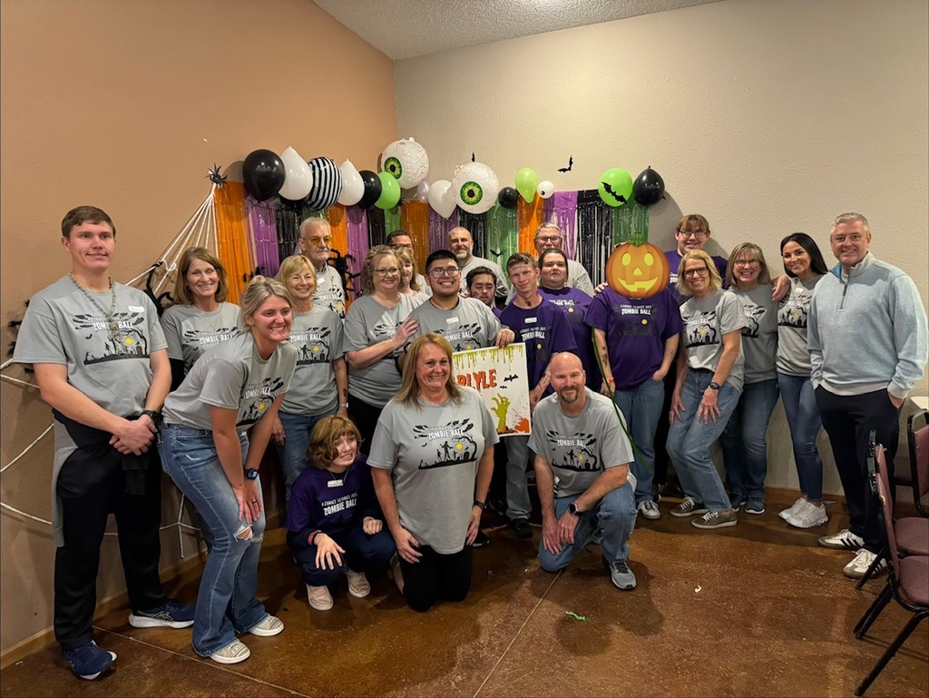 group photo of students and helpers