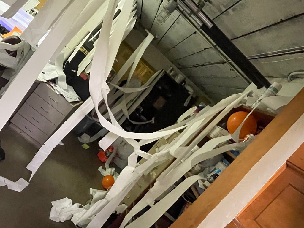 The locker room is covered in toliet paper
