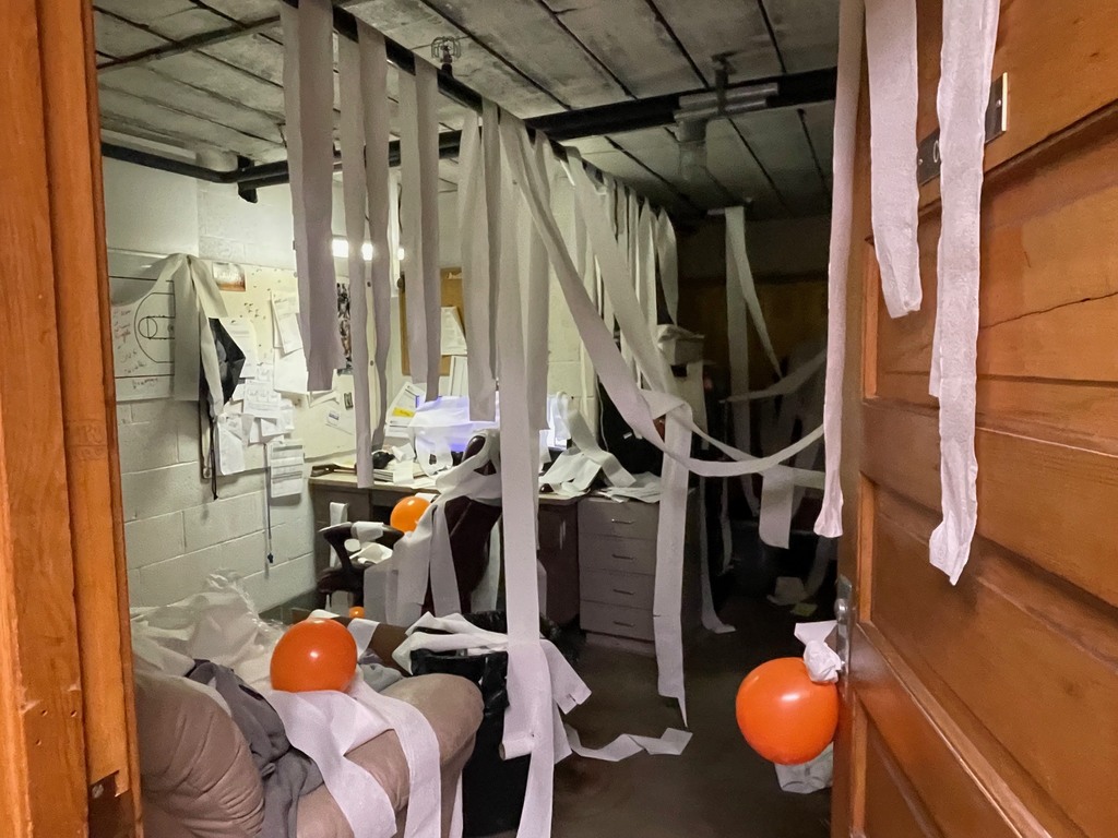The locker room is covered in toliet paper