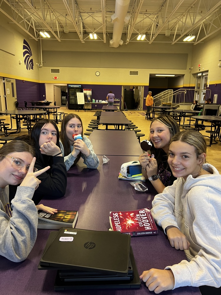 students pose with rewards