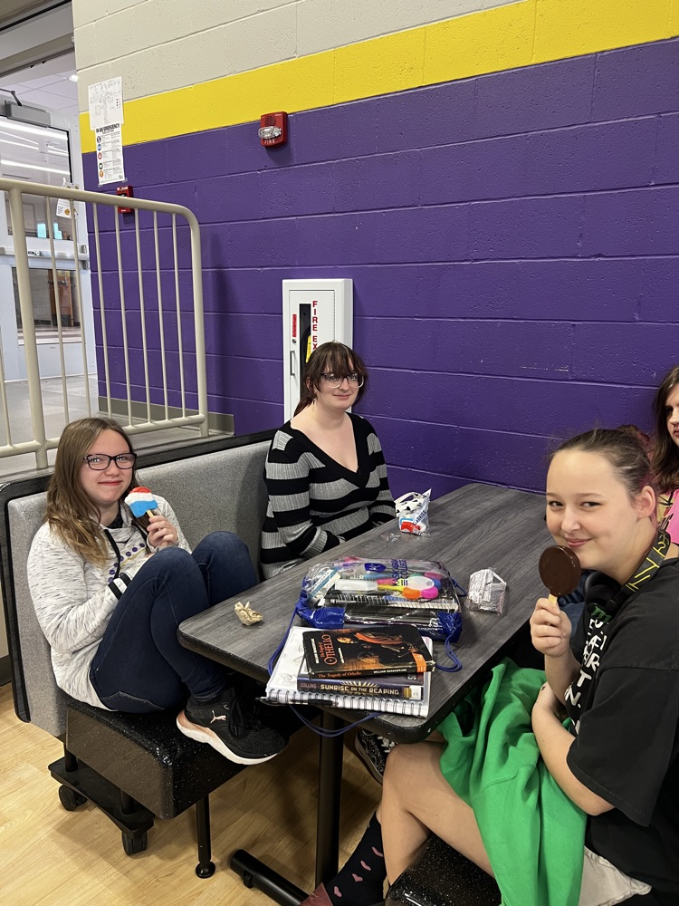 students pose with rewards