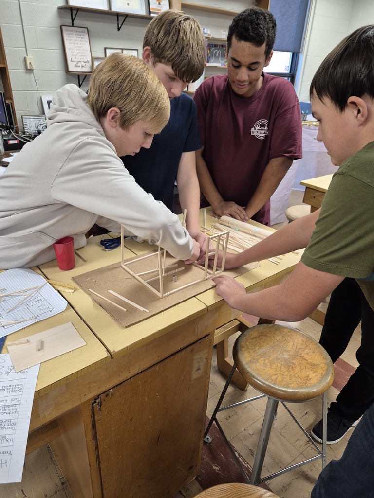 Students work together in Ms. Millburg's shop