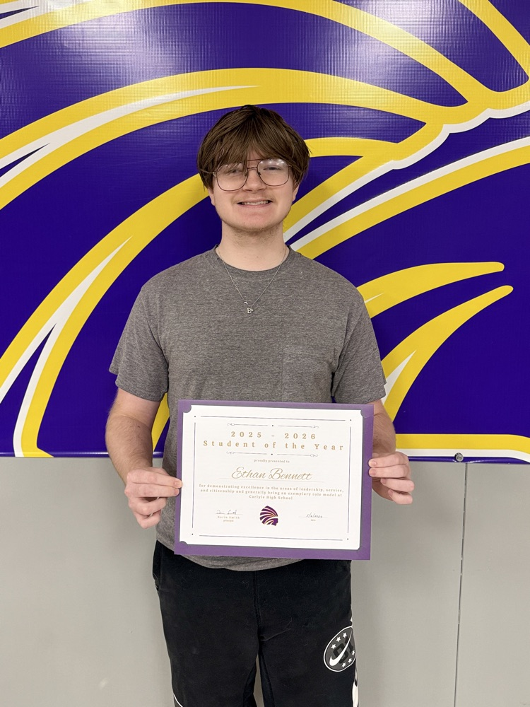 Ethan holding his certificate