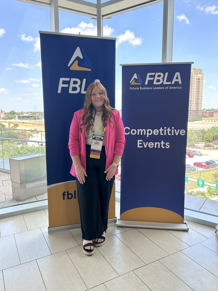 mabry in front of competitive events sign