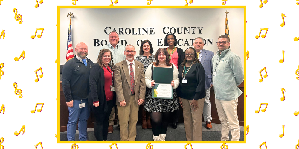 group photo with board members, teacher, principal, supervisor, and student